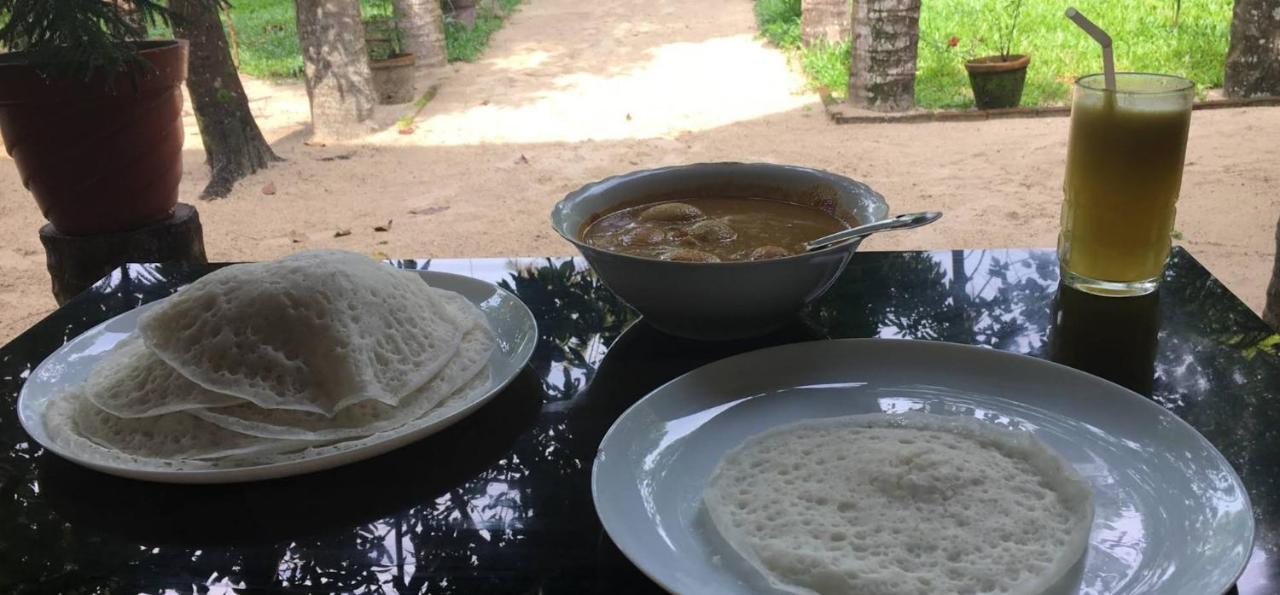 Marari Nadiya Hotel Mararikulam Buitenkant foto