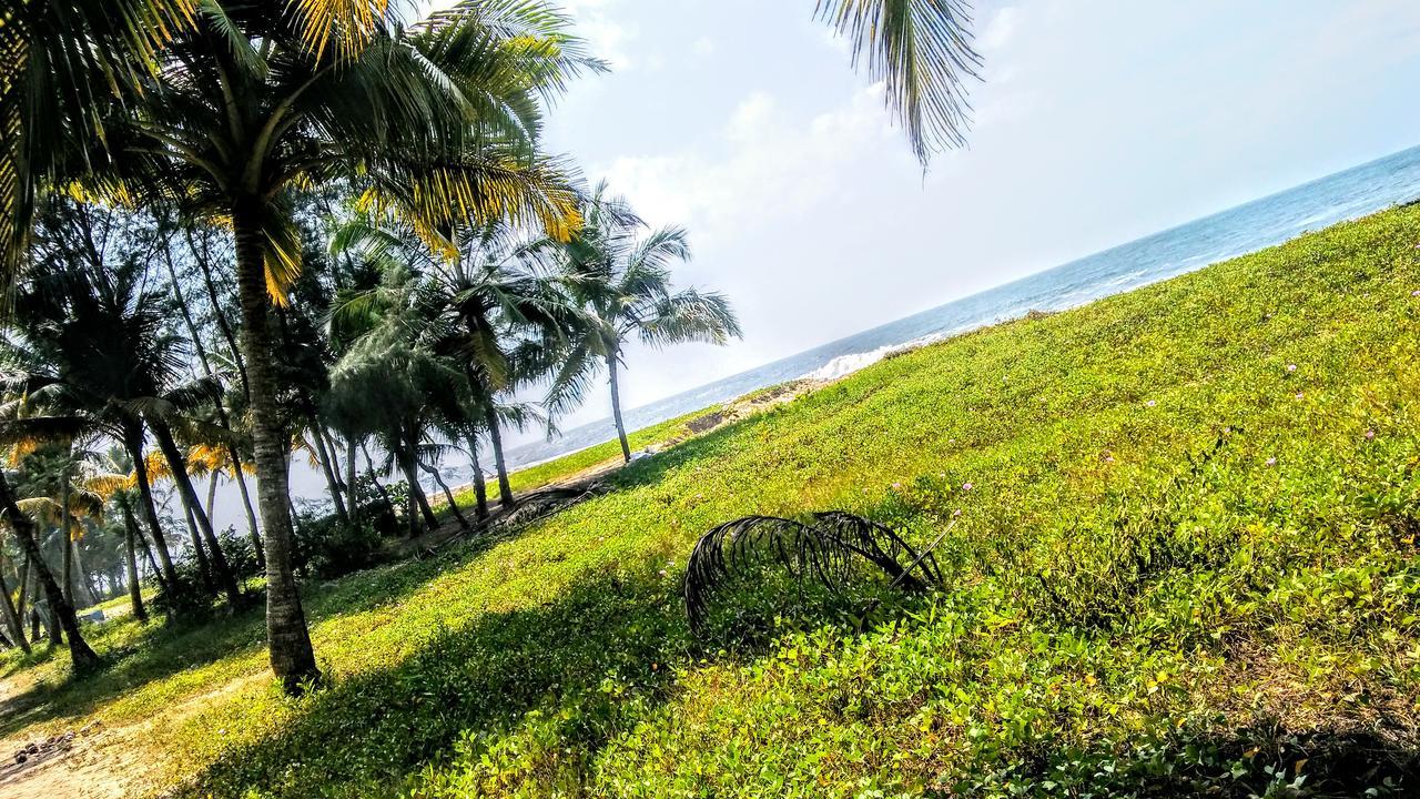 Marari Nadiya Hotel Mararikulam Buitenkant foto